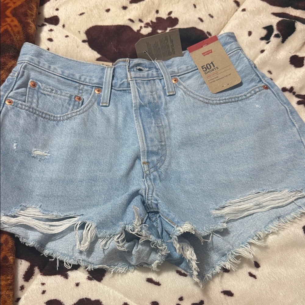 Levi's Women's Distressed Light Blue Denim Shorts